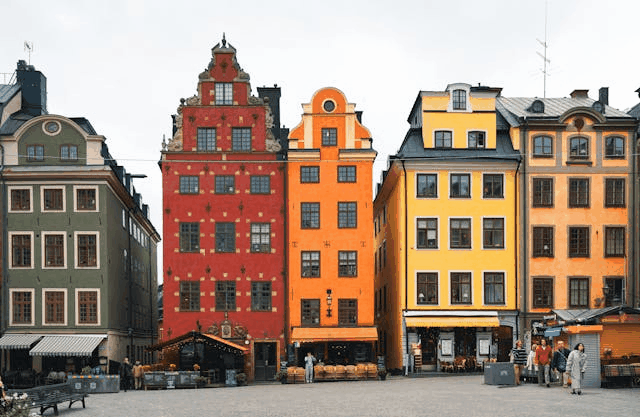 In this example, we use our tool to convert a static GIF photo of Stockholm buildings from horizontal to vertical orientation. In the tool options, we enter the new width and height values (300 by 417 pixels) for the vertical output GIF and select the "Full Cover Fit" fitting mode. In this mode, the GIF completely fills the vertical frame. This allows us to focus on the two central buildings while cropping off other buildings from the left and right sides. (Source: Pexels.)