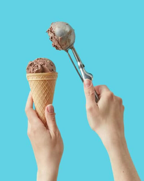 In this example, we start with a fully opaque JPG image that has no transparency and convert it into a transparent GIF by removing its background. To do it, we click on the light blue background color in the input JPG and activate the "Create a Transparent GIF" option. The color similarity setting of 21% allows us to remove all of the slightly different shades of the selected blue color that are present in the background and around the ice cream cone. (Source: Pexels.)